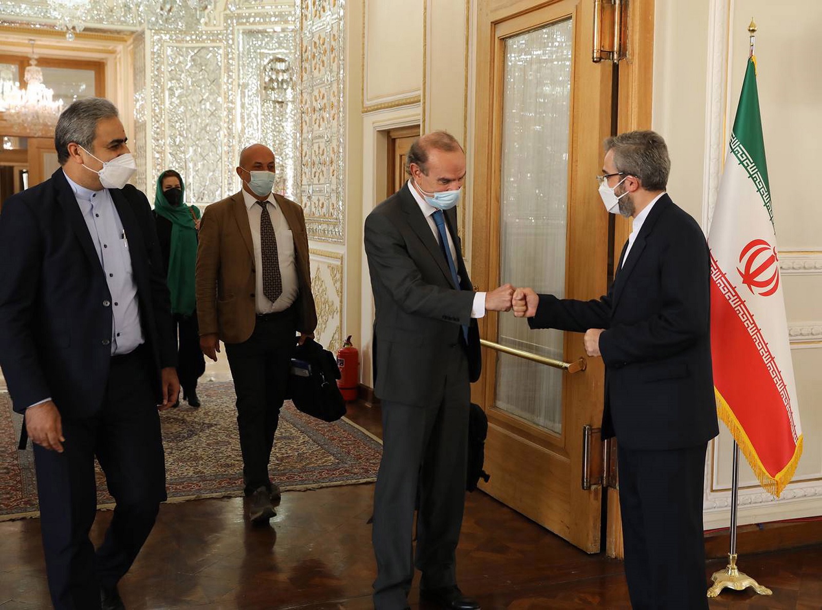 epa09523044 A handout photo made available by Iran's Ministry of Foreign Affairs shows Iranian Deputy Foreign Minister Ali Bagheri (R) welcoming EU coordinator of nuclear talks Enrique Mora (2-R), in Tehran, Iran, 14 October 2021. Mora is on an official visit to Tehran to discuss with Iranian officials about stalled negotiations to revive the Iran nuclear deal.  EPA/IRANIAN MINISTRY OF FOREIGN AFFAIRS HANDOUT  HANDOUT EDITORIAL USE ONLY/NO SALES