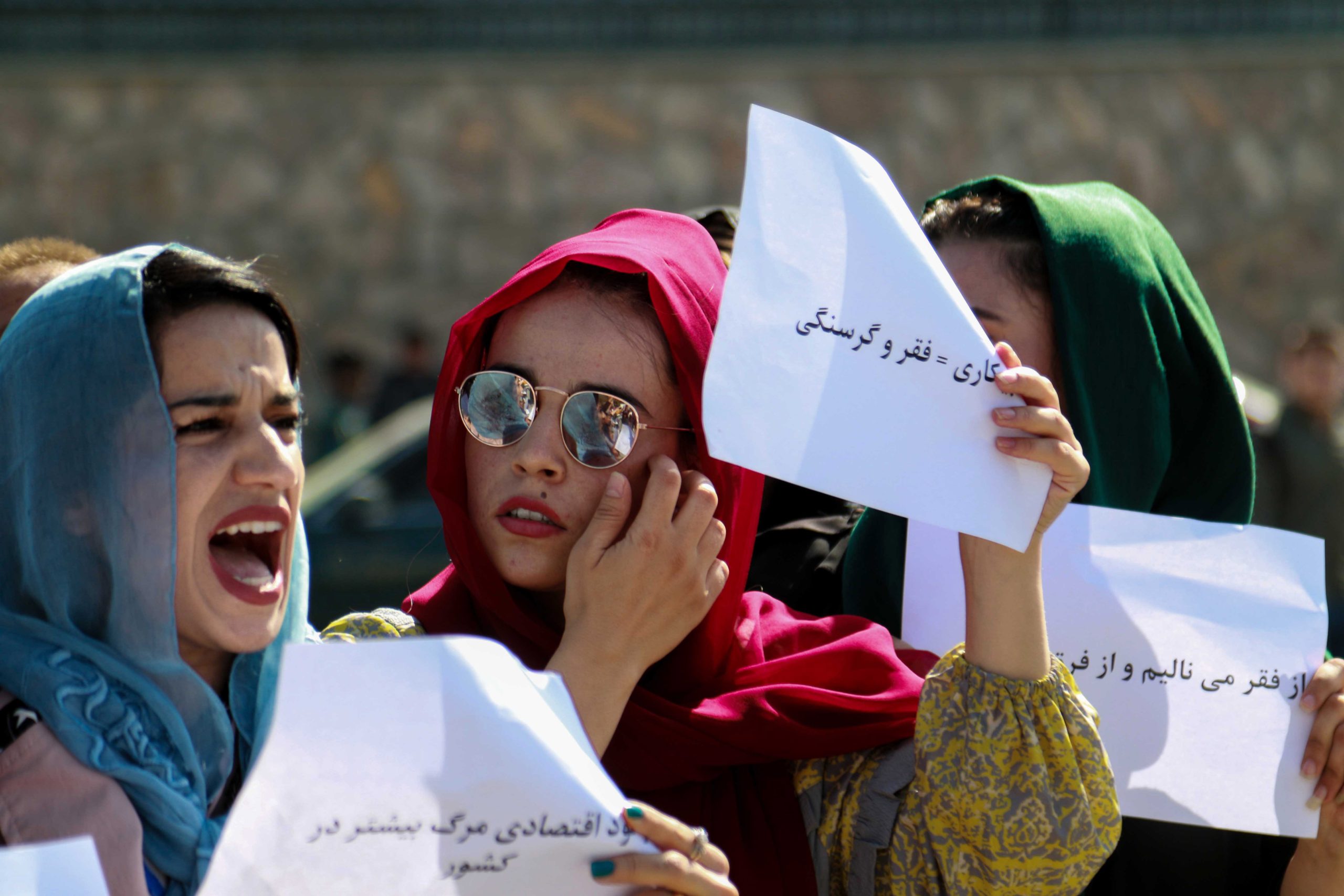 epa09535737 Afghan women shout slogans during a protest to demand that the Taliban government allow the reopening of girls schools and to provide ample employment opportunities, in Kabul, Afghanistan, 21 October 2021. The Taliban promised on 18 October 2021, that they would soon allow all girls to return to school, after not allowing them to access to education in secondary schools following their reopening a month ago. The ban on reopening schools for girls and young people has caused uncertainty among the Afghan people, with criticism from women's rights activists who fear returning to the dark era under the former Taliban regime between 1996 and 2001.  EPA/STRINGER