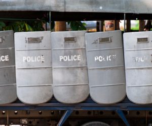 Riot police shields hanging from a truck parked outside the Shwedagon Pagoda in Yangon, Myanmar