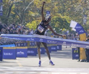 Albert Korir of Kenya crosses the finish line first in the men's division of the New York City Marathon in New York, Sunday, Nov. 7, 2021. (AP Photo/Seth Wenig)