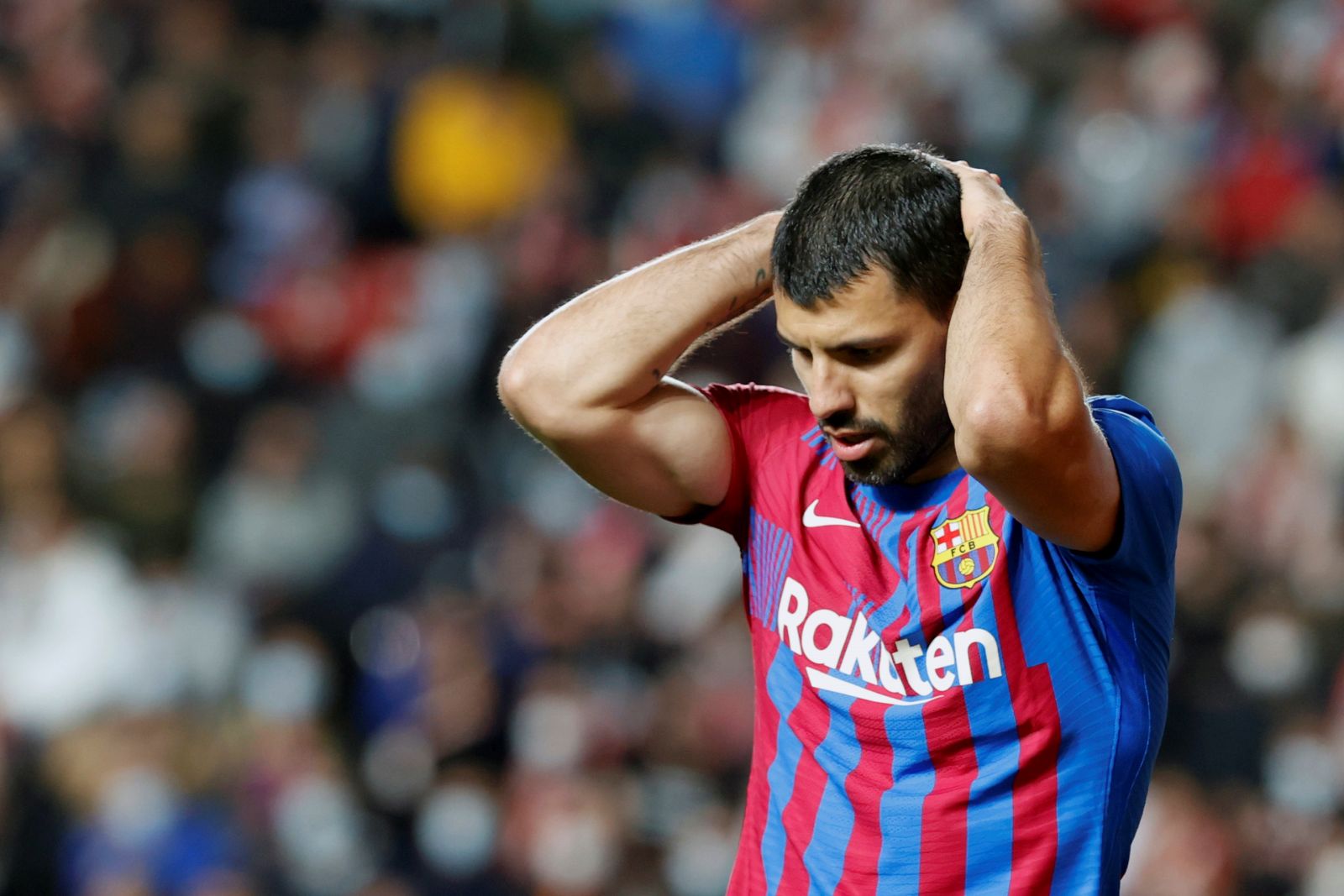 epa09558244 (FILE) - Barcelona's Argentinian striker Sergio 'Kun' Aguero reacts during the Spanish LaLiga soccer match between Rayo Vallecano and FC Barcelona at Estadio de Vallecas stadium in Madrid, Spain, 27 October 2021 (re-issued on 01 November 2021). Barcelona announced on 01 November 2021 that 'Aguero has undergone a diagnostic and therapeutic procedure and during the next three months the effectiveness of the treatment will be evaluated to determine his recovery process'.  EPA/Javier Lizon