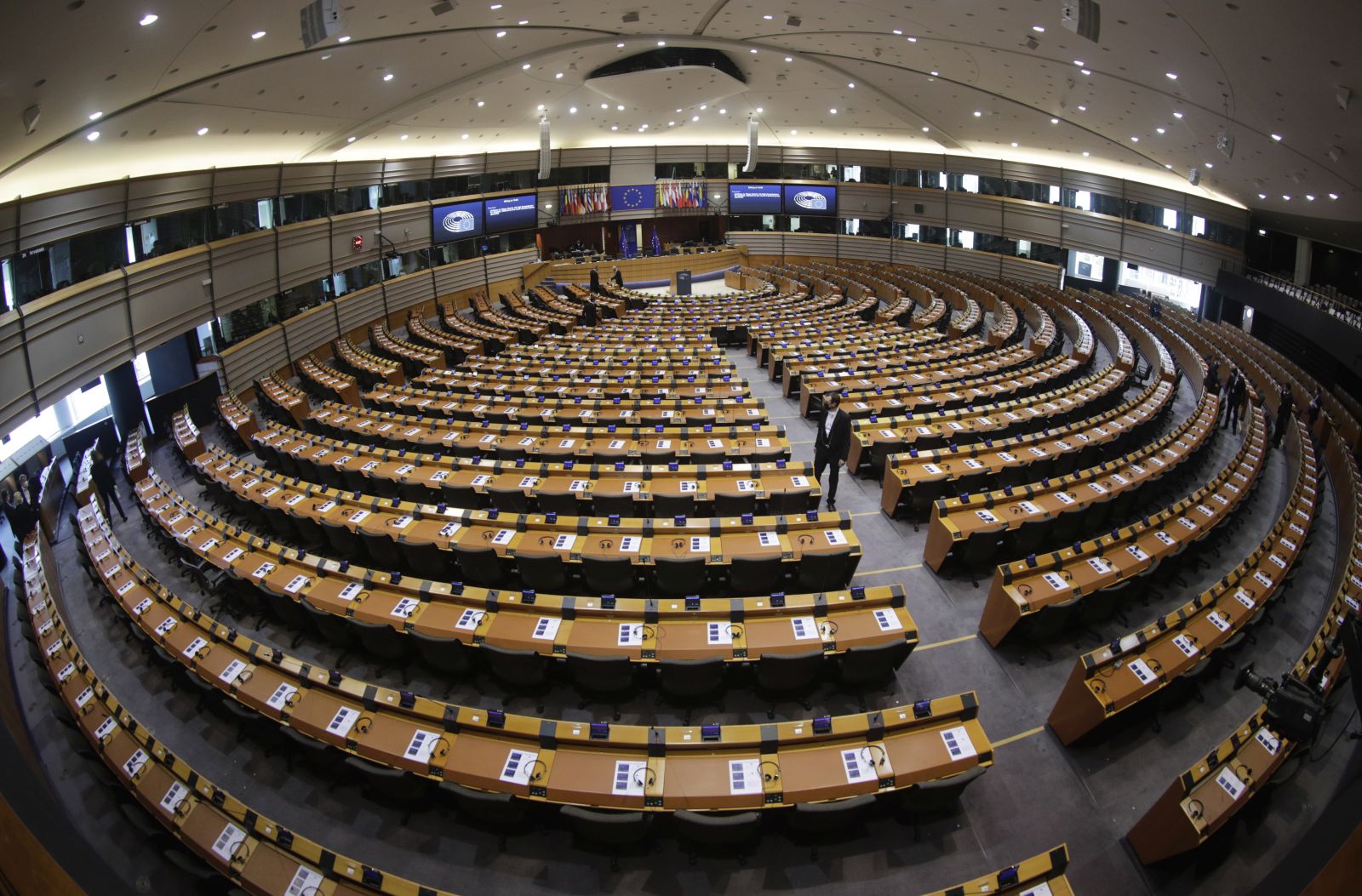 epa09573966 A picture taken with an ultra wide-angle lens shows a general view of the hemicycle ahead of a speech by the United Nations High Commissioner for Refugees (UNHCR) during a mini plenary session of the European Parliament in Brussels, Belgium, 10 November 2021.  EPA/OLIVIER HOSLET
