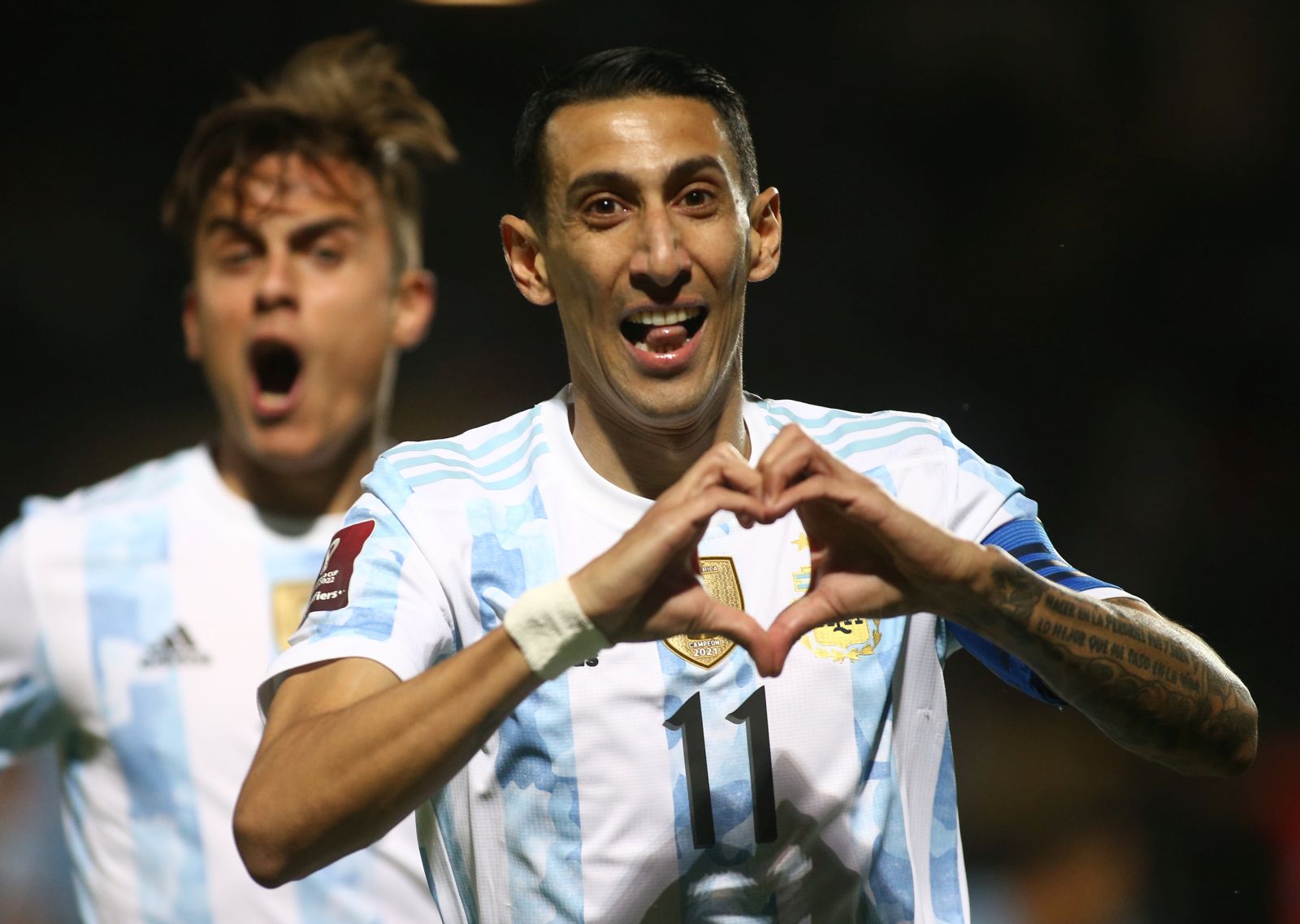 epa09579652 Angel di Maria of Argentina celebrates after scoring during the South American qualifying match for 2022 Qatar World Cup between Uruguay and Argentina at Campeon del Siglo stadium in Montevideo, Uruguay, 12 November 2021.  EPA/ERNSTO RYAN / POOL