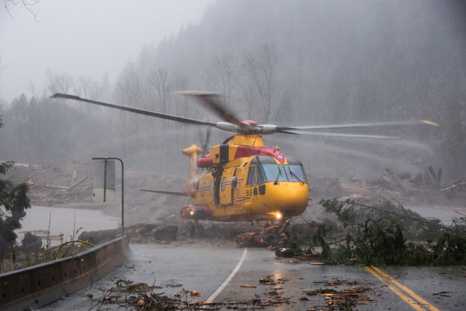 epa09587344 A handout photo made available by the Royal Canadian Air Force showing rescue operations following flooding caused by days of rain in Agassiz, British Columbia, Canada, 16 November 2021 (issued 17 November 2021). One person in reported dead and flooding has caused damage to roads and bridges in western Canada near Vancouver.  EPA/ROYAL CANADIAN AIR FORCE HANDOUT  HANDOUT EDITORIAL USE ONLY/NO SALES