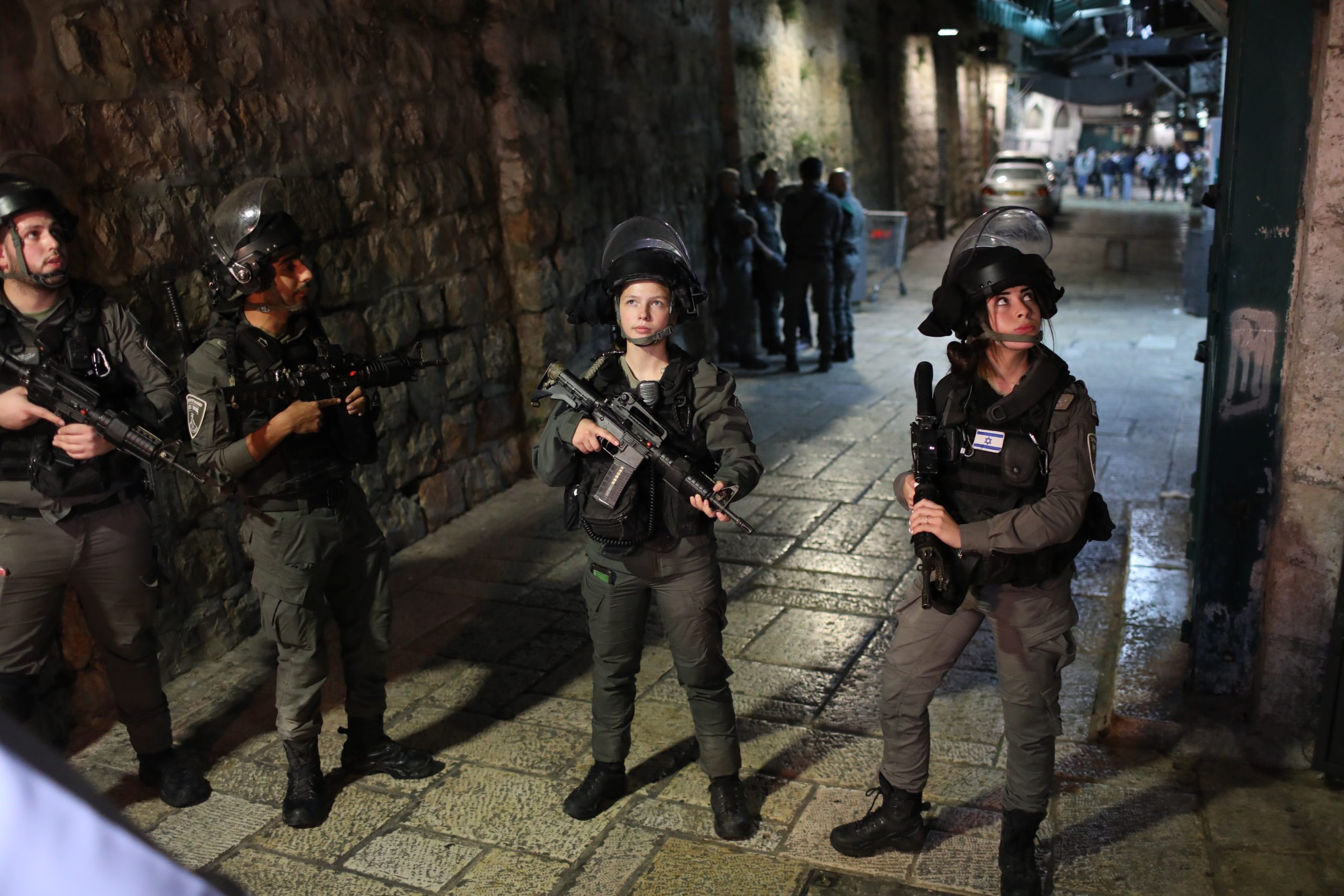 epa09587583 Israeli police at the scene of a stabbing near Damascus gate at the old city of Jerusalem,  17 November 2021. According to Israeli Police, a man with a knife attacked two Israeli police officers wounded them and the attacker has been shot dead by security forces.  EPA/ABIR SULTAN