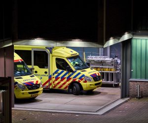 epa09599499 A view on an ambulance and Ikazia Hospital in Rotterdam, the Netherlands, 23 November 2021. A second patient with Covid-19 is transferred from the Ikazia Hospital in Rotterdam to Germany in a special ambulance.  Germany has offered 20 beds to the Netherlands in a help to ease the pressure of Dutch hospitals as daily coronavirus cases rose sharply.  EPA/PHIL NIJHUIS