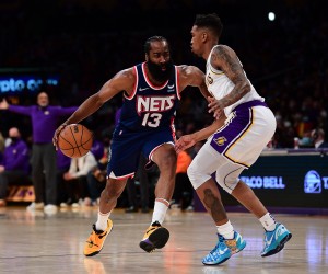 Dec 25, 2021; Los Angeles, California, USA; Brooklyn Nets guard James Harden (13) moves the ball against Los Angeles Lakers guard Malik Monk (11) during the first half at Crypto.com Arena. Mandatory Credit: Gary A. Vasquez-USA TODAY Sports