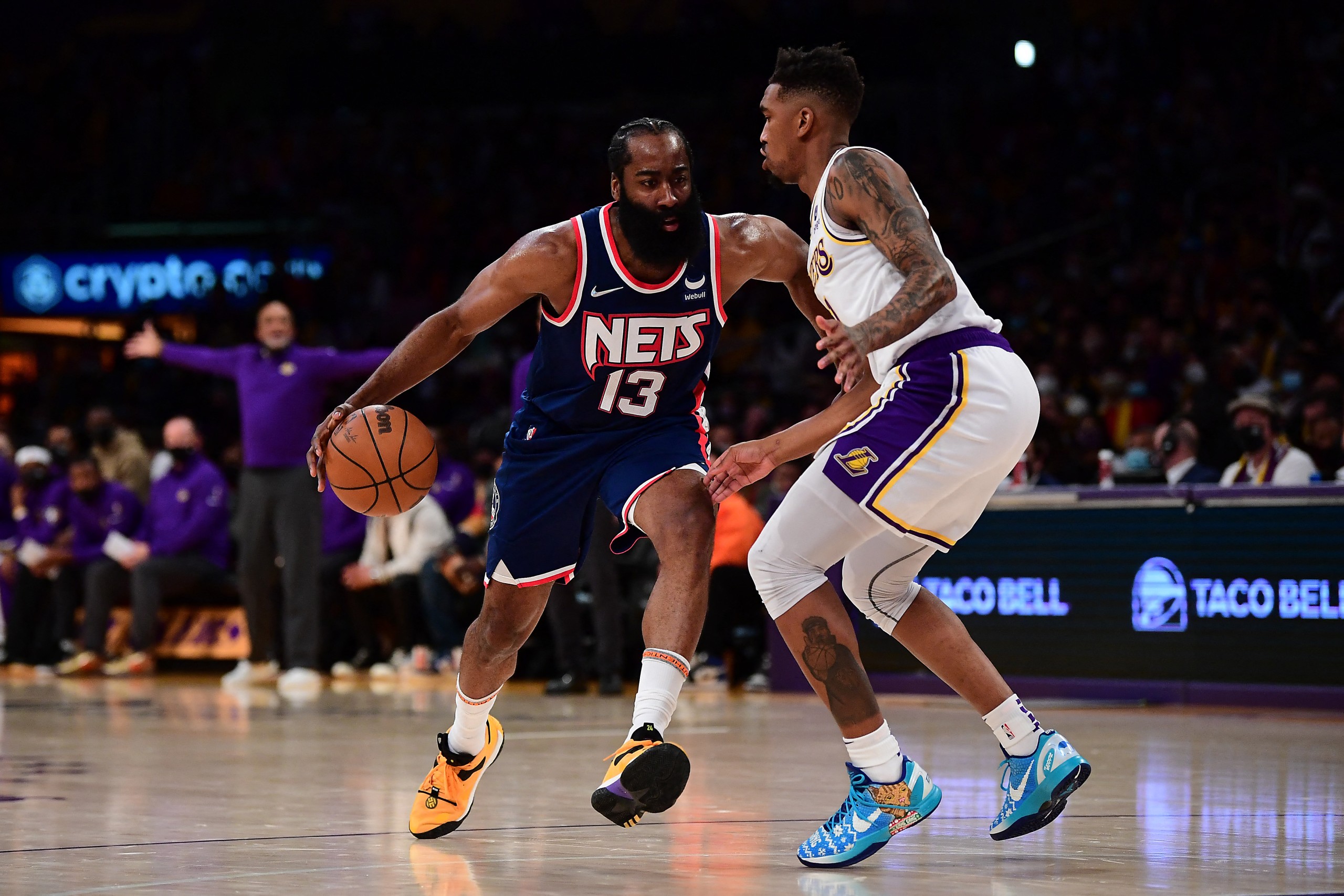Dec 25, 2021; Los Angeles, California, USA; Brooklyn Nets guard James Harden (13) moves the ball against Los Angeles Lakers guard Malik Monk (11) during the first half at Crypto.com Arena. Mandatory Credit: Gary A. Vasquez-USA TODAY Sports