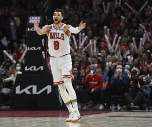 Chicago Bulls guard Zach LaVine claps after scoring against the Denver Nuggets during the second half of an NBA basketball game Monday, Dec. 6, 2021, in Chicago. (AP Photo/Matt Marton)