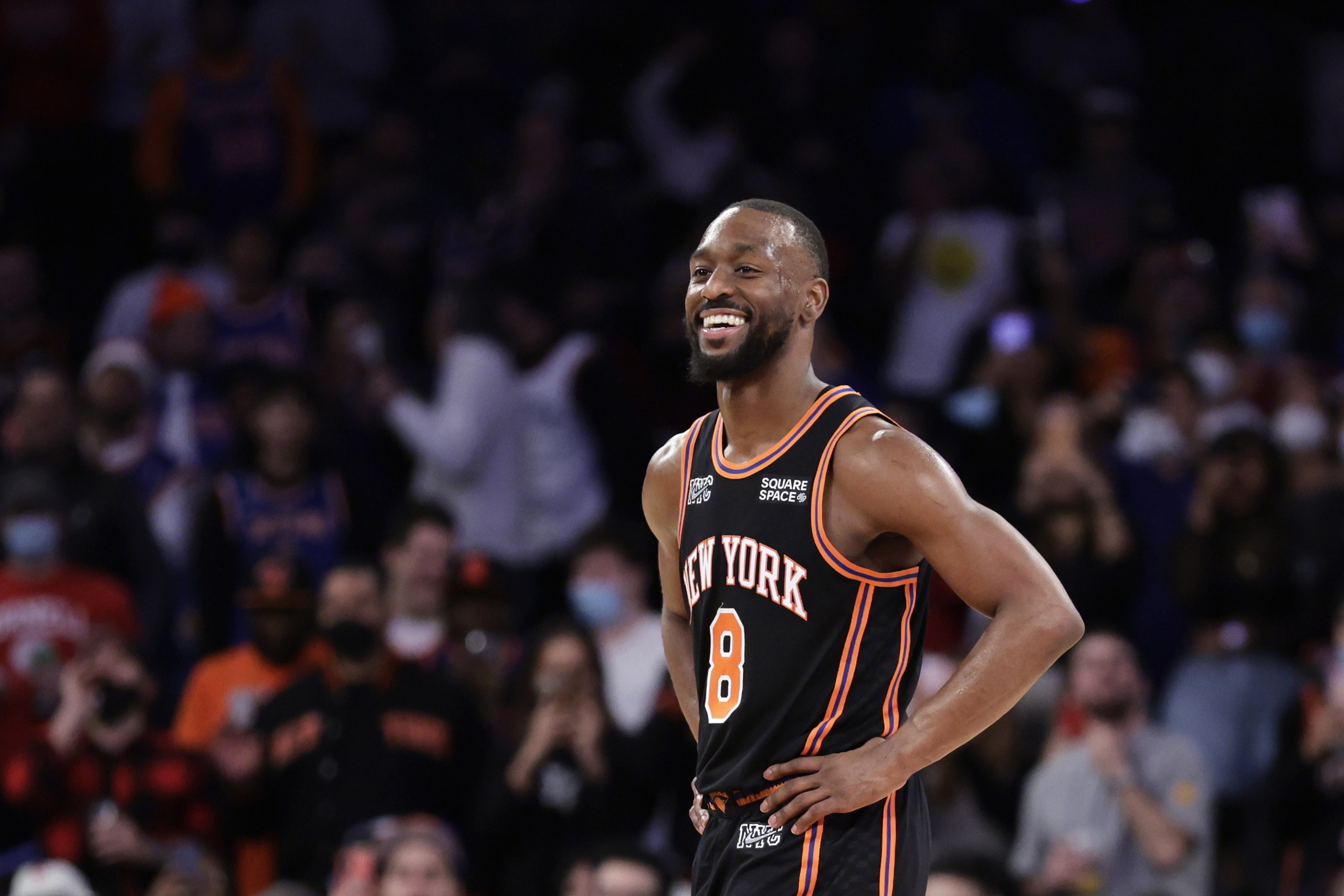 New York Knicks guard Kemba Walker (8) reacts against the Atlanta Hawks during the second half of an NBA basketball game Saturday, Dec. 25, 2021, in New York. The Knicks won 101-87. (AP Photo/Adam Hunger)