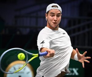 epa09613039 Jan-Lennard Struff of Germany in action during his singles tennis match against Cameron Norrie of Britain at the 2021 Davis Cup quarter finals Britain vs Germany in Innsbruck, Austria, 30 November 2021.  EPA/PHILIPP GUELLAND