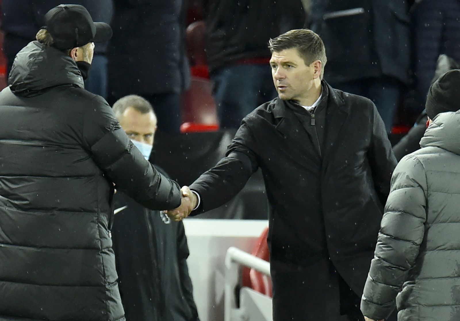 epa09636909 Aston Villa manager Steven Gerrard (R) greets Liverpool manager Jurgen Klopp (L) after the English Premier League match between Liverpool and Aston Villa in Liverpool, Britain, 11 December 2021.  EPA/PETER POWELL EDITORIAL USE ONLY. No use with unauthorized audio, video, data, fixture lists, club/league logos or 'live' services. Online in-match use limited to 120 images, no video emulation. No use in betting, games or single club/league/player publications