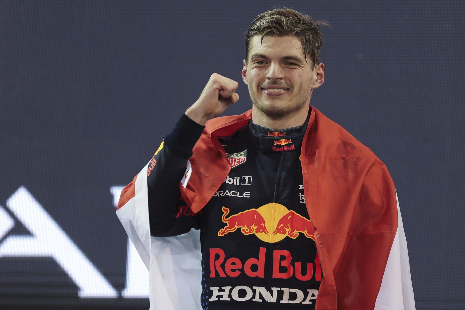 epa09638464 Dutch Formula One driver Max Verstappen of Red Bull Racing celebrates after winning the 2021 Formula One Grand Prix of Abu Dhabi at Yas Marina Circuit in Abu Dhabi, United Arab Emirates, 12 December 2021.  EPA/KAMRAN JEBREILI / POOL