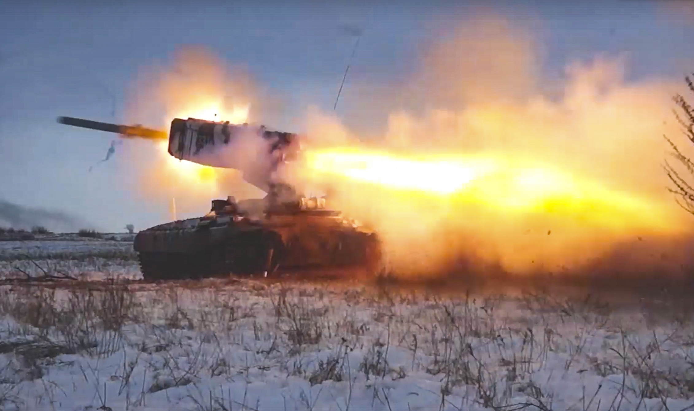 epa09645510 A handout still image took from handout video made available by the Russian Defence ministry press service on 16 December 2021 shows Russian TOS-1 heavy flame thrower system is a 220mm 30-barrel multiple rocket launcher system fires during military drills near Orenburg, Russia, 16 December 2021. The head of the CIA, William Burns, claims that in recent weeks the United States has been observing an 'unusual build-up of Russian troops' near the borders of Ukraine, as well as alleged plans to destabilise the country. To accusations of the West of preparing an invasion of Ukraine, Russia replies that it does not threaten any country, and the movement of troops across its own territory is its sovereign right.  EPA/RUSSIAN DEFENCE MINISTRY PRESS SERVICE / HANDOUT  HANDOUT EDITORIAL USE ONLY/NO SALES