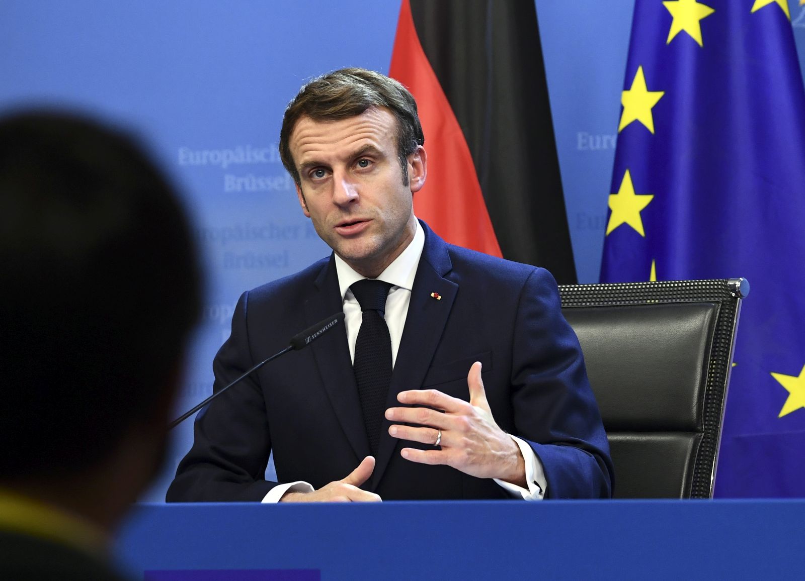 epa09645879 France's President Emmanuel Macron speaks during a joint press conference with Germany's Chancellor Olaf Scholz (out of frame) during an European Union (EU) summit at the European Council Building at the EU headquarters in Brussels, Belgium, 17 December 2021.  EPA/JOHN THYS / POOL