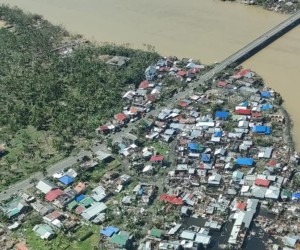 epa09646324 A handout picture made available by the Philippine Coast Guard (PCG) shows an aerial view of a typhoon-affected village in Siargao island, southern Philippines, 17 December 2021. According to the National Disaster Risk Reduction and Management Council (NDRRMC), at least six people have died and closed to 200,000 others living along the path of Typhoon Rai were evacuated.  EPA/PHILIPPINE COAST GUARD HANDOUT -- BEST QUALITY AVAILABLE -- HANDOUT EDITORIAL USE ONLY/NO SALES
