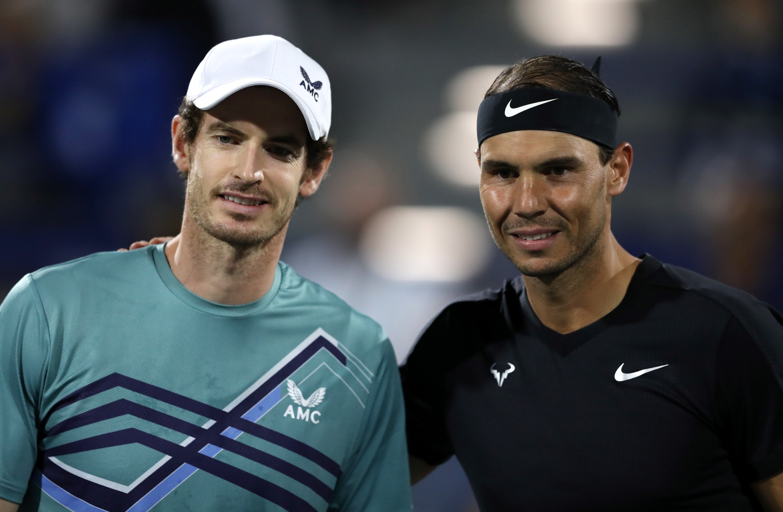 epa09647059 Andy Murray (L) of Great Britain and Rafael Nadal of Spain before their semi final match during the Mubadala World Tennis Championship at the International Tennis Centre, Zayed Sports City in Abu Dhabi, United Arab Emirates, 17 December 2021.  EPA/ALI HAIDER