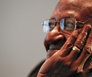 epa09656977 (FILE) - Former South African Anglican Archbishop Desmond Tutu listens to speeches during the launch of his storybook bible titled 'Children of God', at the Cape Town Book Fair, South Africa, 30 July 2010 (reissued 26 December 2021). Desmond Tutu has died aged 90, the South African presidency said on 26 December 2021. As a leading spokesperson for the rights of black South Africans, Tutu in 1984 received the Nobel Prize for Peace for his role in the opposition to apartheid in South Africa.  EPA/NIC BOTHMA