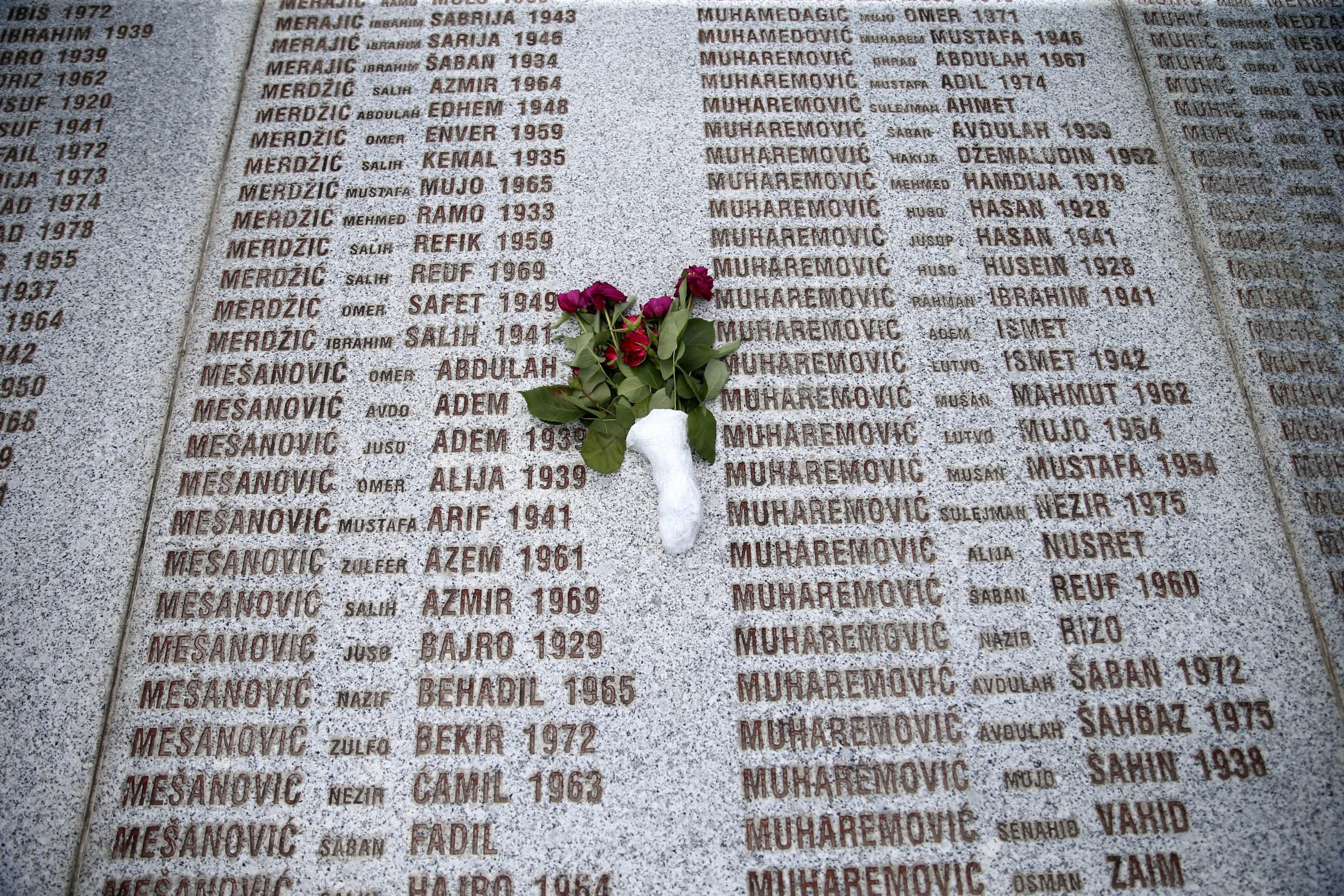 FILE PHOTO: A view shows a memorial plaque with names of killed people in the Srebrenica-Potocari Genocide Memorial Center, Bosnia and Herzegovina, June 8, 2021. REUTERS/Dado Ruvic/File Photo