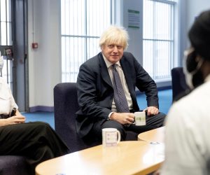Britain's Prime Minister Boris Johnson, and Deputy PM Dominic Raab (not pictured) visit HMP Isis, Greenwich, ahead of the publication of the Prisons White Paper in London, Britain December 7, 2021. Geoff Pugh/Pool via REUTERS
