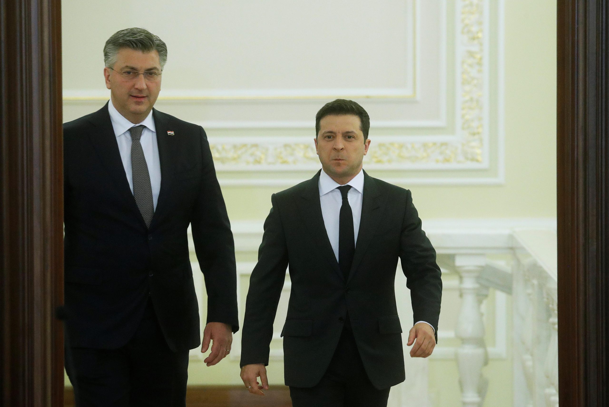 Ukrainian President Volodymyr Zelenskiy and Croatian Prime Minister Andrej Plenkovic arrive to deliver a joint statement in Kyiv, Ukraine December 8, 2021. REUTERS/Valentyn Ogirenko/Pool