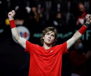 epa09620859 Andrey Rublev from Russia celebrates winning against Dominik Koepfer from Germany after their singles match for the semi final Davis Cup tie between Russia and Germany held at Madrid Arena sports pavilion in Madrid, central Spain, 04 December 2021.  EPA/EMILIO NARANJO