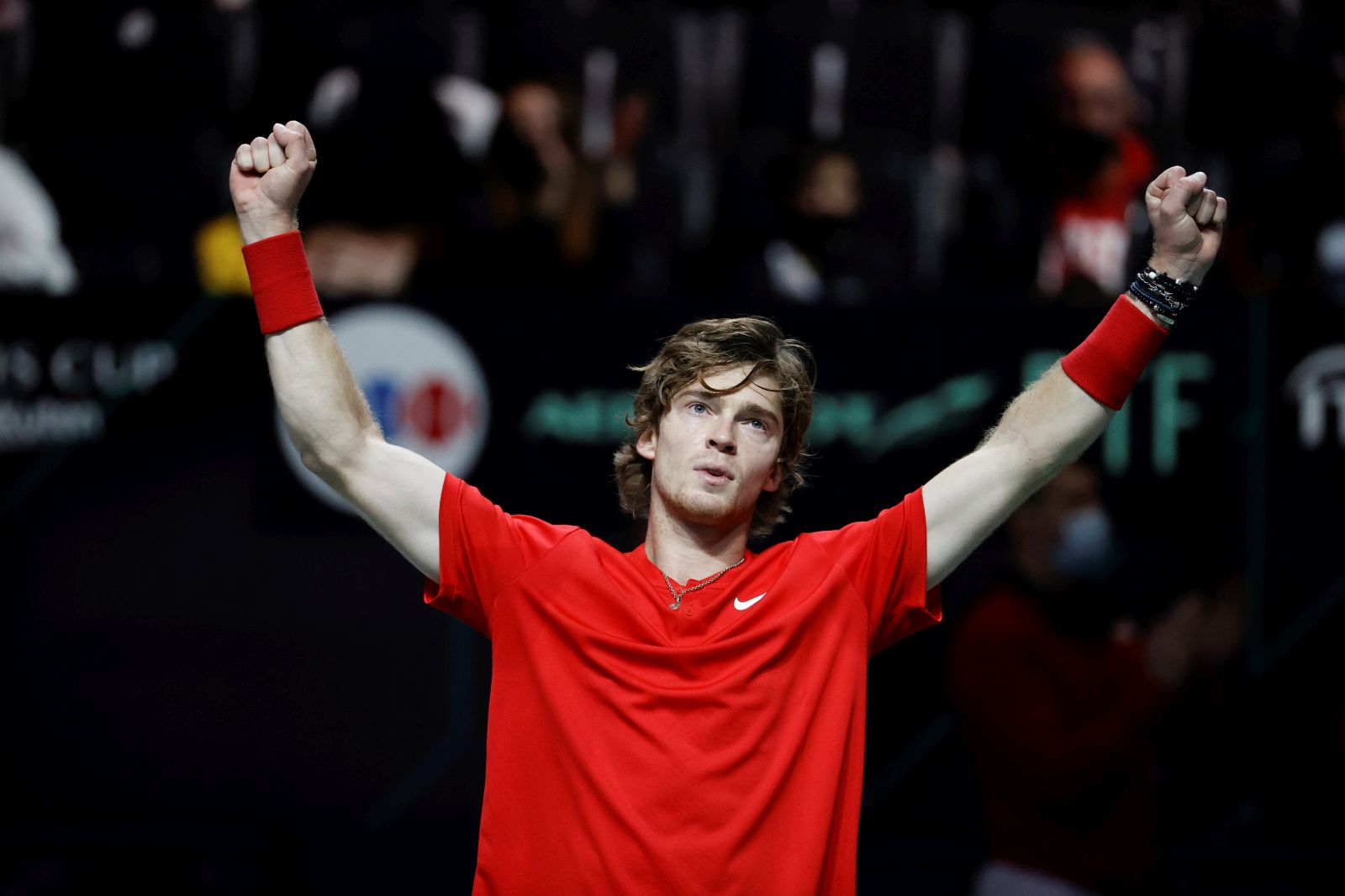 epa09620859 Andrey Rublev from Russia celebrates winning against Dominik Koepfer from Germany after their singles match for the semi final Davis Cup tie between Russia and Germany held at Madrid Arena sports pavilion in Madrid, central Spain, 04 December 2021.  EPA/EMILIO NARANJO