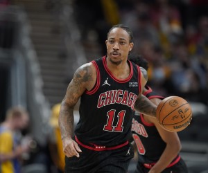 Chicago Bulls' DeMar DeRozan (11) dribbles during the second half of an NBA basketball game against the Indiana Pacers, Friday, Dec. 31, 2021, in Indianapolis. (AP Photo/Darron Cummings)