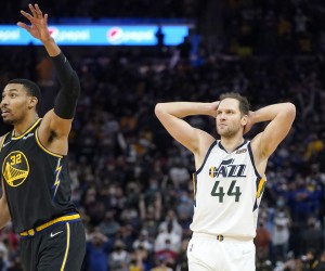 Utah Jazz forward Bojan Bogdanovic (44) reacts as he watches a missed shot next to Golden State Warriors forward Otto Porter Jr. (32) during the second half of an NBA basketball game in San Francisco, Sunday, Jan. 23, 2022. (AP Photo/Jeff Chiu)