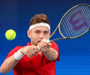 epa09662342 Filip Krajinovic of Team Serbia hits a shot during his match against Viktor Durasovic of Team Norway during Day 1 of the ATP Cup tournament at Ken Rosewall Arena in Sydney, Australia, 01 January 2022.  EPA/DAVID GRAY AUSTRALIA AND NEW ZEALAND OUT  EDITORIAL USE ONLY