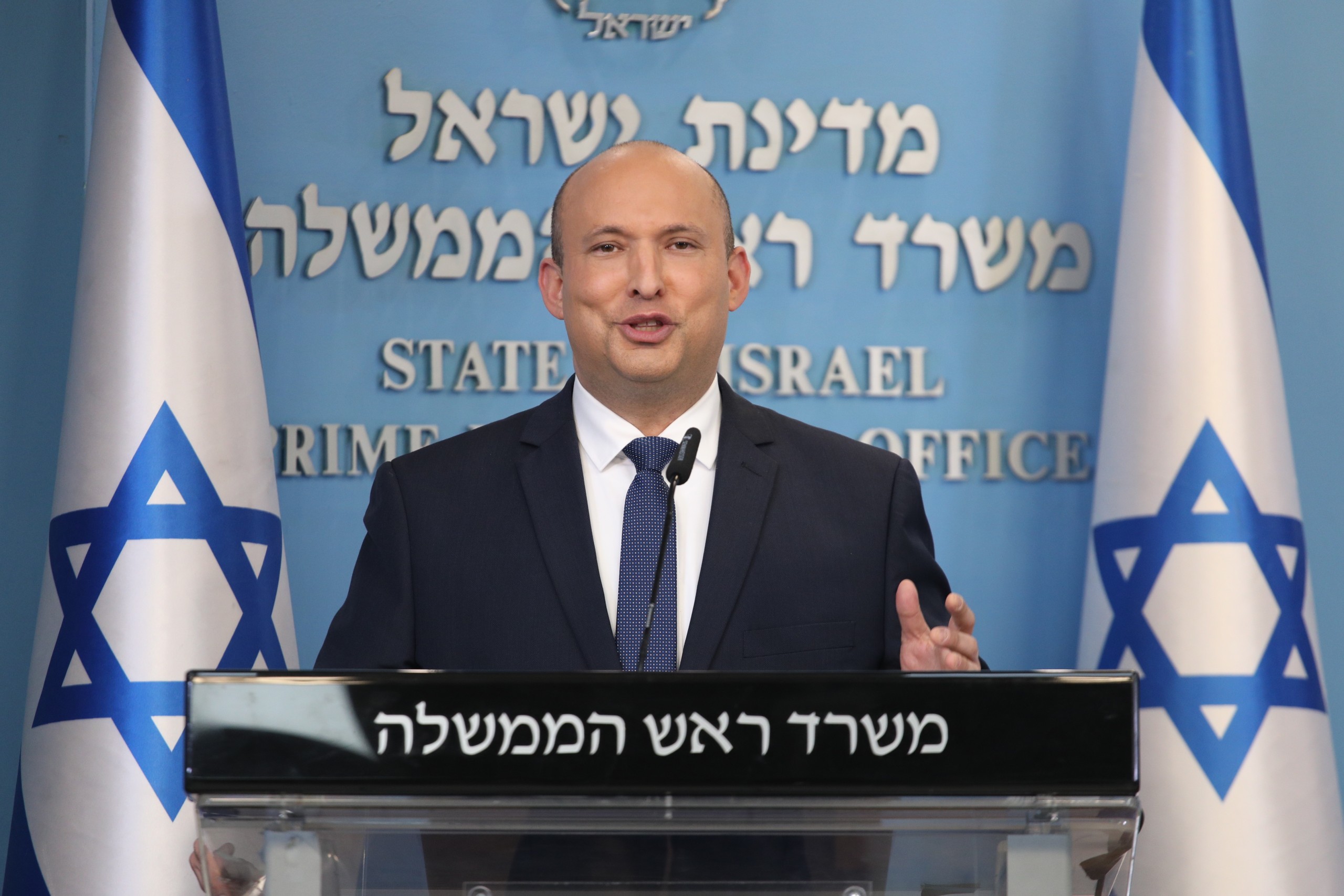 epa09663856 Israeli Prime Minister Naftali Bennett speaks during a press conference at the Prime Minister's Office in Jerusalem, Israel, 02 January 2022. Israeli Prime Minister Bennett announced that the Health Ministry has approved Israelis over the age of 60 and medical workers to receive a fourth dose of the vaccine against COVID-19.  EPA/Emil Salman / POOL