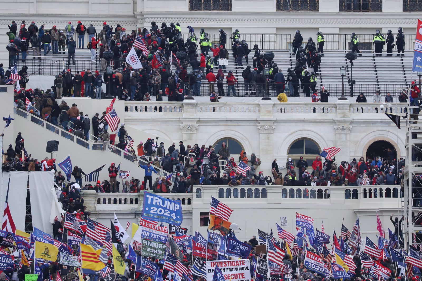 epa09664290 (19/24) (FILE) - Pro-Trump protesters occupy the grounds of the West Front of the US Capitol, including the inaugural stage and viewing stands, in Washington, DC, USA, 06 January 2021 (reissued 03 January 2021). Following the November 2020 US presidential election, a tone set by supporters of defeated US President Donald Trump escalated further. Trump, who was refusing to concede the victory of Joe Biden, claiming voter fraud and rigged elections, told supporters and white nationalist extreme-right group Proud Boys to respectively 'Stop the Steal' and to 'stand back and stand by'. His social media accounts were suspended and the alt-right platform Parler gained in user numbers. 
 
On 06 January 2021, incumbent US vice president Pence was due to certify the Electoral College votes before Congress, the last step in the process before President-elect Biden was to be sworn in. In the morning, pro-Trump protesters had gathered for the so-called Save America March. Soon after Trump finished his speech at the Ellipse, the crowd marched to the Capitol. The attack had begun. 
 
Rioters broke into the Capitol building where the joint Congress session was being held. Lawmakers barricaded themselves inside the chambers and donned tear gas masks while rioters vandalized the building, some even occupying offices such as House Speaker Pelosi's. Eventually in the evening the building was cleared from insurrectionists, and the Congress chambers reconvened their session, confirming Joe Biden as the winner of the 2020 US presidential election. 

In the aftermath, more than 600 people were charged with federal crimes in connection to the insurgency, and close Trump aides such as Steve Bannon, Mark Meadows and Roger Stone were subpoenaed by the House select committee investigating the attack. Trump himself was acquitted by the Senate in his second impeachment trial, this time for "inciting an insurrection".  EPA/MICHAEL REYNOLDS  ATTENTION: This Image is part of a PHOTO