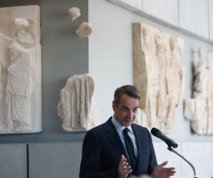 epa09664679 Greek Prime Minister Kyriakos Mitsotakis delivers a speech during a ceremony marking the arrival of fragments of the sculptural decoration of the Parthenon at the Acropolis Museum in Athens, Greece, 03 January 2022. Ten fragments of the Parthenon were transferred from the warehouse of the National Archaeological Museum, where they were kept, for display at the Acropolis Museum.  EPA/YANNIS KOLESIDIS
