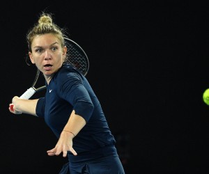 epa09671134 Simona Halep of Romania in action during her match against Viktorija Golubic of Switzerland on day five of the Melbourne Summer Set tennis tournament at Melbourne Park in Melbourne, Australia, 07 January 2022.  EPA/JAMES ROSS  AUSTRALIA AND NEW ZEALAND OUT