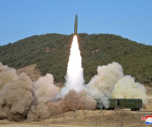 epa09686376 A photo released by the official North Korean Central News Agency (KCNA) shows a a missile fired from a railway during a firing drill of the railway-borne missile regiment held in North Pyongan Province, North Korea on 14 January 2022 (issued on 15 January 2022).  EPA/KCNA   EDITORIAL USE ONLY  EDITORIAL USE ONLY