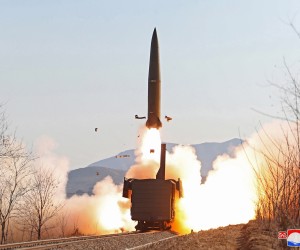 epa09686374 A photo released by the official North Korean Central News Agency (KCNA) shows a a missile fired from a railway during a firing drill of the railway-borne missile regiment held in North Pyongan Province, North Korea on 14 January 2022 (issued on 15 January 2022).  EPA/KCNA   EDITORIAL USE ONLY
