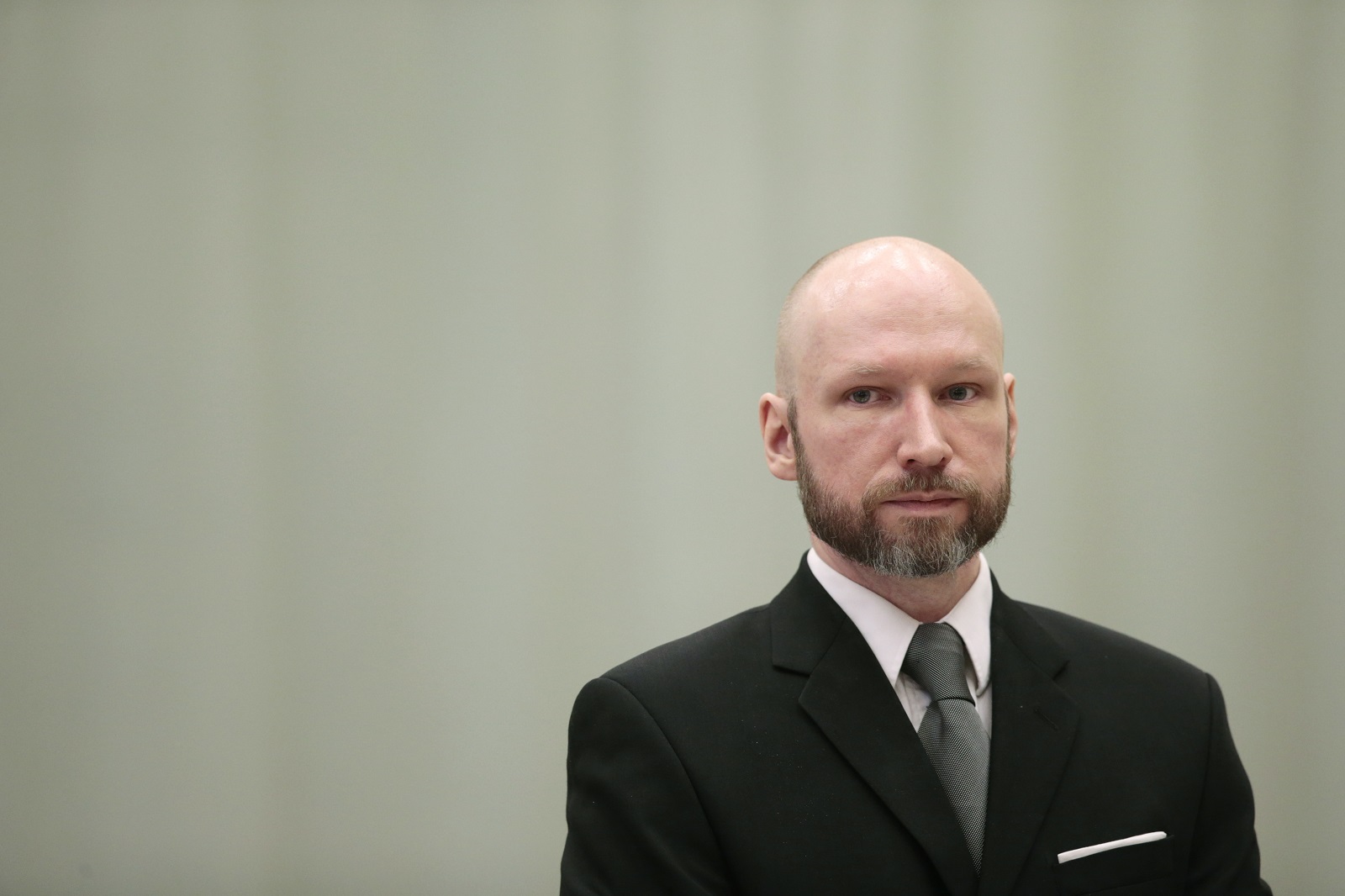 epa09691484 (FILE) - Anders Behring Breivik attends the last day of the appeal case in the Borgarting Court of Appeal at the Telemark prison gym, in Skien, Norway, 18 January 2017 (reissued 17 January 2022). Breivik, who changed his name to Fjotolf Hansen in 2017, is to appear before court for his parole hearing in Oslo on 18 January 2022. Mass murderer Anders Behring Breivik was sentenced to a maximum term of 21 years for killing 77 people in bomb and shooting attacks on 22 July 2011, and is entitled under Norwegian law to have his sentenced reviewed after ten years served.  EPA/LISE AASERUD NORWAY OUT *** Local Caption *** 53252761