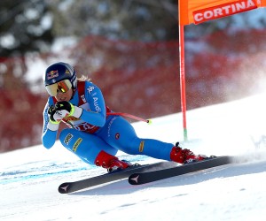 epa09702033 Sofia Goggia of Italy speeds down the slope during the Women's Downhill race at the FIS Alpine Skiing World Cup in Cortina d'Ampezzo, Italy, 22 January 2022.  EPA/ANDREA SOLERO