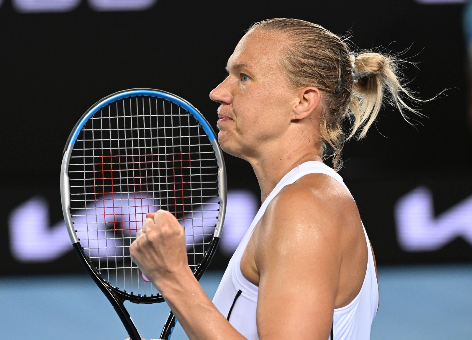 epa09706392 Kaia Kanepi of Estonia reacts after winning  her 4th round singles match against Aryna Sabalenka of Belarus at the Australian Open Grand Slam tennis tournament at Melbourne Park, in Melbourne, Australia, 25 January 2022.  EPA/DEAN LEWINS AUSTRALIA AND NEW ZEALAND OUT