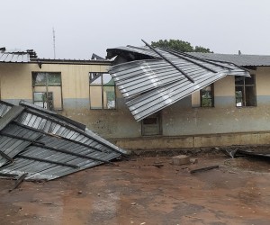 epa09706731 A handout photo made available by the International Federation of Red Cross and Red Crescent Societies (IFRC) shows a roof blown off a school building in Angoche, Mozambique 24 January 2022. Heavy rains and wind from a tropical weather system crossed the Mozambique chanel after striking Madagascar and has caused extensive damage due to the high winds and flooding in Mozambique.  EPA/IFRC HANDOUT  HANDOUT EDITORIAL USE ONLY/NO SALES