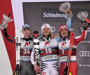 epa09709173 Third placed Manuel Feller (R) of Austria, winner Linus Strasser (C) of Germany and second placed Atle Lie Mcgrath (L) of Norway celebrate on the podium after the men's Slalom race of the FIS Alpine Skiing World Cup event in Schladming, Austria, 25 January 2022.  EPA/CHRISTIAN BRUNA
