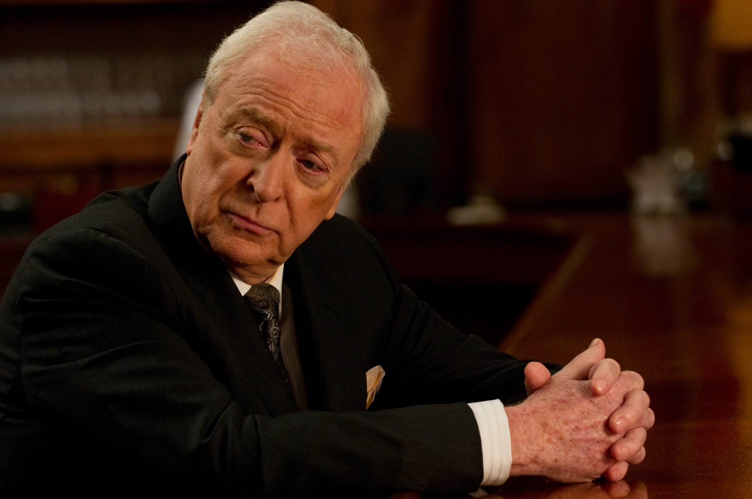 Michael Caine plays an investor in <em>Now You See Me, </em>a film about heist-pulling illusionists.