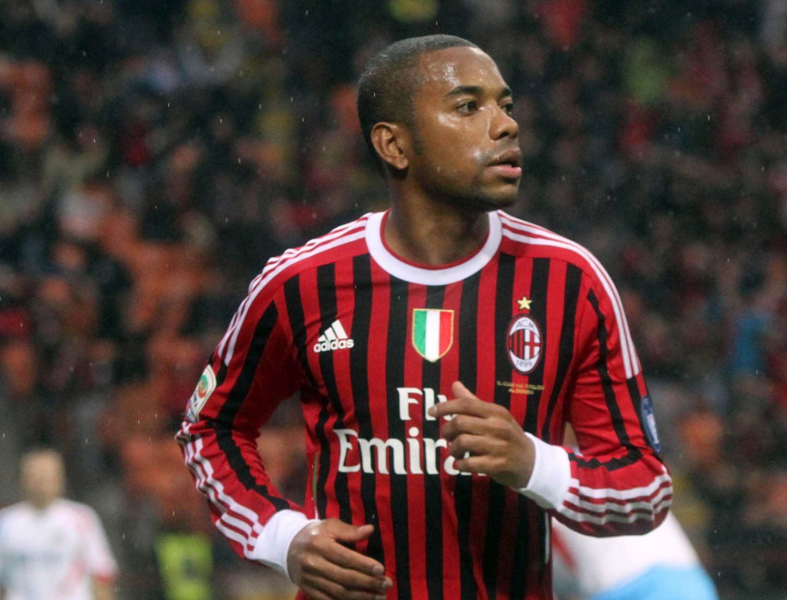 epa09696850 (FILE) - AC Milan's Brazilian forward Robinho celebrates after scoring the 2-0 during the Serie A soccer match between AC Milan and Catania at the Giuseppe Meazza stadium, Milan, Italy, 06 November 2011 (reissued 20 Januart 2022). Italy's Supreme Court confirmed on 19 January 2022 Robinho's nine-year prison sentence for sexually assaulting a woman. The assault took place in 2013 when Robinho was playing for AC Milan. Robinho was convicted of rape in 2017 and received a nine-year prison sentence. With the ruling of the Supreme Court the appeals process has finished. Robinho is living in Brazil and it is currently unclear whether he will serve his sentence at all as the Brazilian constitution bans the extradition of its citizens.  EPA/MATTEO BAZZI *** Local Caption *** 50105905