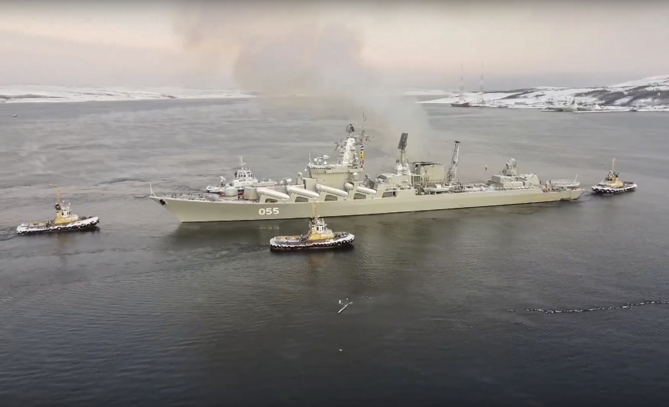 epa09712185 A frame grab taken from a handout video made available by the Russian Defence Ministry Press Service shows Russian cruiser Marshal Ustinov preparing to take part in exercises in the Barents Sea in Severomorsk, Russia, 26 January 2022 (issued 27 January 2022). A detachment of Russian navy ships and support vessels of the Northern Fleet entered the Barents Sea as part of an exercise with the Arctic Expeditionary Group of Forces and troops.  EPA/RUSSIAN DEFENCE MINISTRY PRESS SERVICE HANDOUT -- BEST QUALITY AVAILABLE -- MANDATORY CREDIT: RUSSIAN DEFENCE MINISTRY PRESS SERVICE -- HANDOUT EDITORIAL USE ONLY/NO SALES