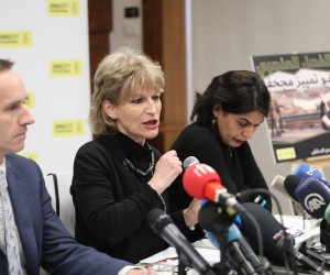 epa09720884 Secretary General of Amnesty International (AI), French human rights expert Agnes Callamard (C) speaks during a press conference in East Jerusalem, 01 February 2022. Amnesty International presented on the day a new report in which they allege that 'Israeli authorities must be held accountable for committing the crime of apartheid against Palestinians'.  EPA/ABIR SULTAN