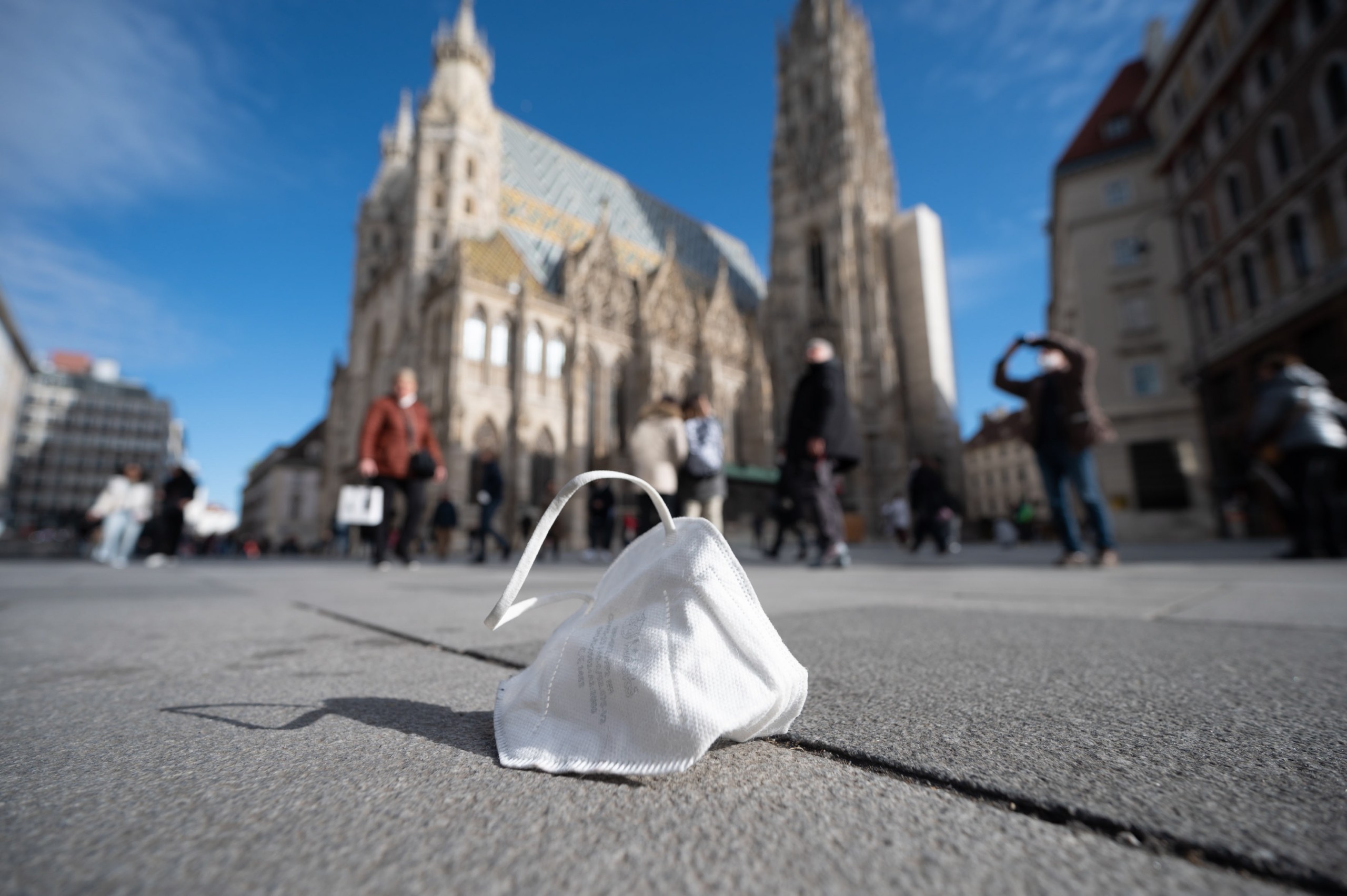 epa09725106 A face mask on the street in the center of Vienna, Austria, 03 february 2022. A session of the Austrian Federal Council was taking place in Vienna to debate mandatory Covid-19 vaccination for people over 18 years of age.  EPA/DANIEL NOVOTNY