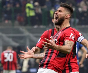 epa09730607 AC Milan's Olivier Giroud celebrates after scoring during the Italian Serie A soccer match between FC Inter and AC Milan at Giuseppe Meazza stadium in Milan, Italy, 05 February 2022.  EPA/MATTEO BAZZI