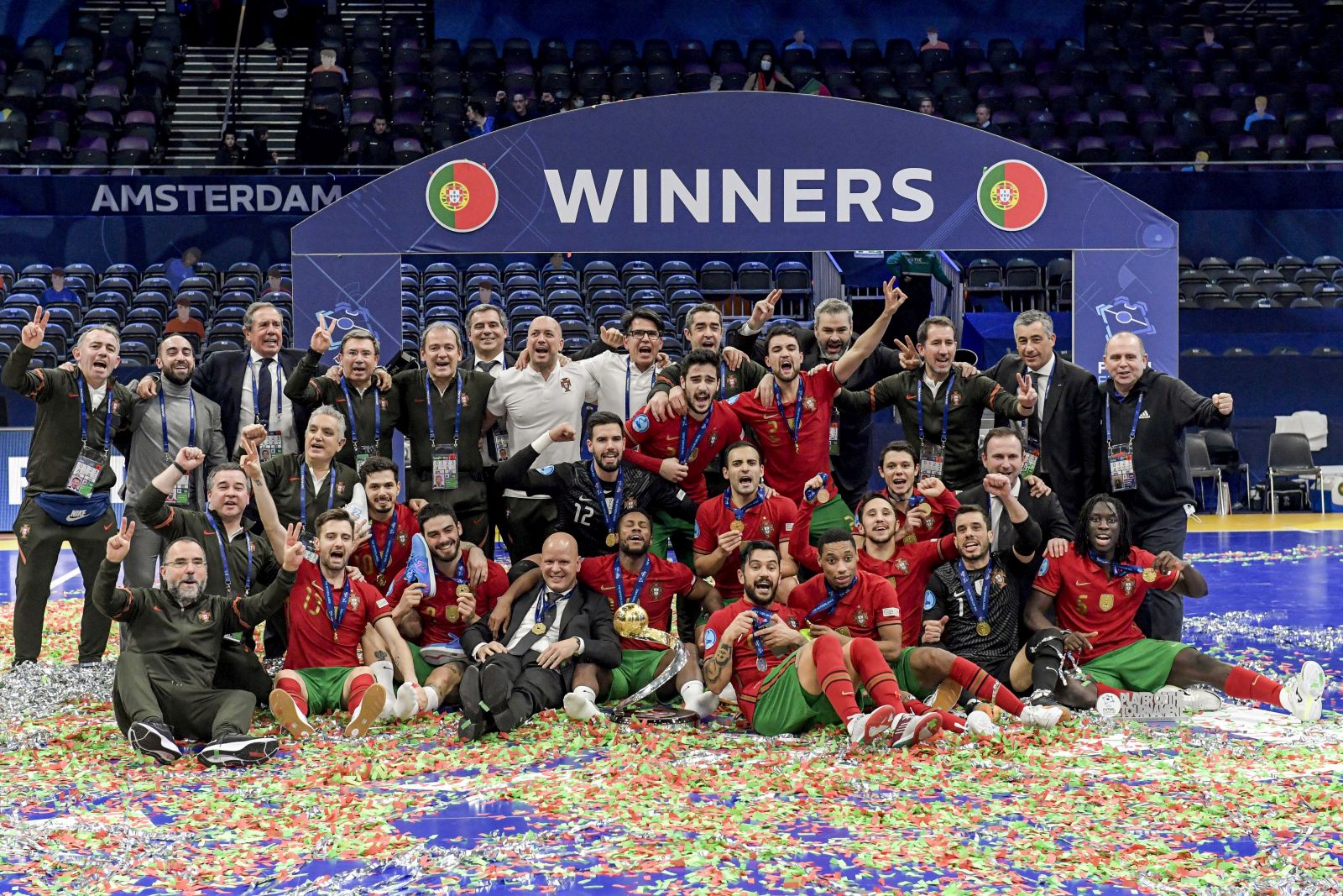 epa09733609 Portugal players celebrate with the trophy after the UEFA Futsal EURO 2022 final match between Portugal and Russia at the Ziggo Dome in Amsterdam, Netherlands, 06 February 2022.  EPA/Gerrit van Keulen