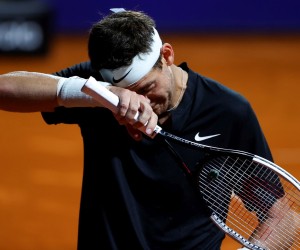 epa09739819 Argentinian Juan Martin del Potro reacts after losing against Argentinian Federico Delbonis  during the Argentina Open tennis match at the Buenos Aires Lawn Tennis Club in Buenos Aires, Argentina, 08 February 2022.  EPA/Juan Ignacio Roncoroni