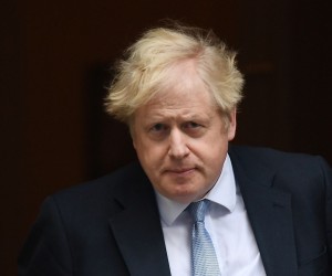 epa09740859 British Prime Minister Boris Johnson departs 10 Downing Street for Prime Minister's Questions at parliament in London, Britain, 09 February 2022. Johnson remains under pressure due to the ongoing police inquiry over 'partygate'  EPA/ANDY RAIN